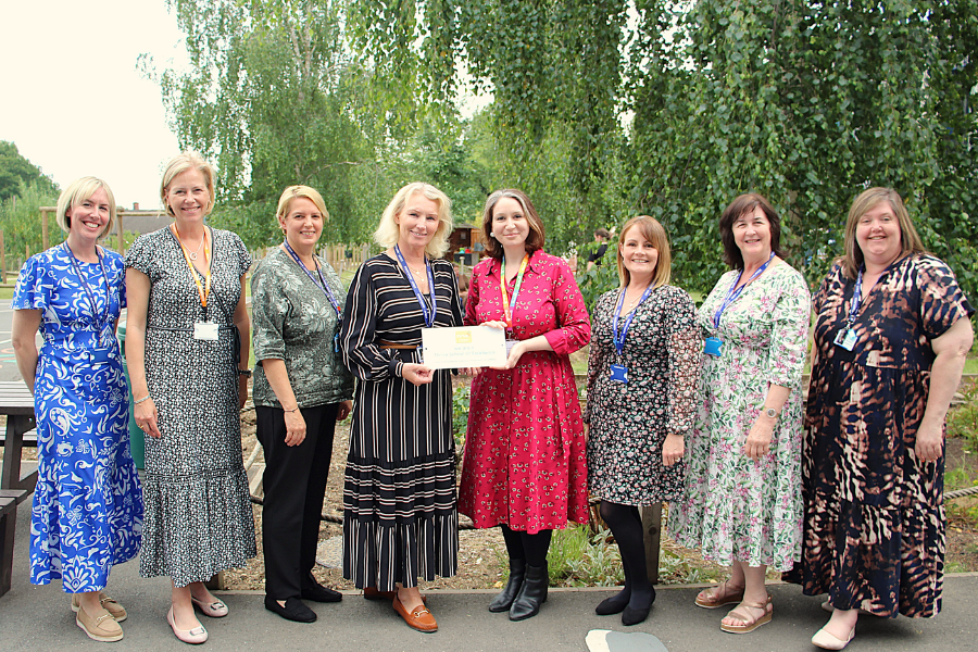 Team at Drapers' Maylands Primary School receiving their Thrive School of Excellence award